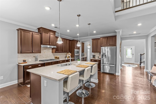 11209 Flenniken Ct, Charlotte, NC 28277 - kitchen with appliances with stainless steel finishes, crown molding, recessed lighting, dark wood finished floors, and tasteful backsplash