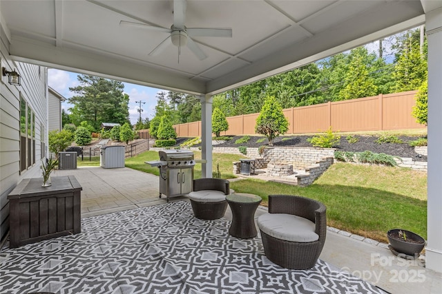 11209 Flenniken Ct, Charlotte, NC 28277 - fenced backyard with a ceiling fan, a patio area, and area for grilling