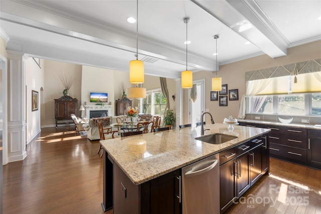 1204 Vaugelas Ct, Monroe, NC 28110 - kitchen featuring stainless steel dishwasher, a fireplace, dark wood-style flooring, beamed ceiling, and open floor plan