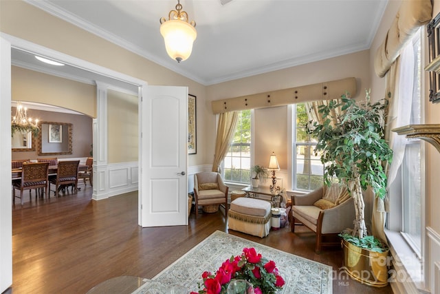1204 Vaugelas Ct, Monroe, NC 28110 - sitting room featuring wood finished floors, a chandelier, ornamental molding, a wainscoted wall, and a decorative wall