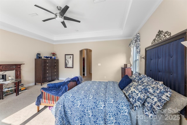 1204 Vaugelas Ct, Monroe, NC 28110 - bedroom with arched walkways, a raised ceiling, carpet floors, ornamental molding, and a ceiling fan