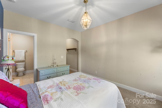 1204 Vaugelas Ct, Monroe, NC 28110 - bedroom featuring arched walkways and baseboards