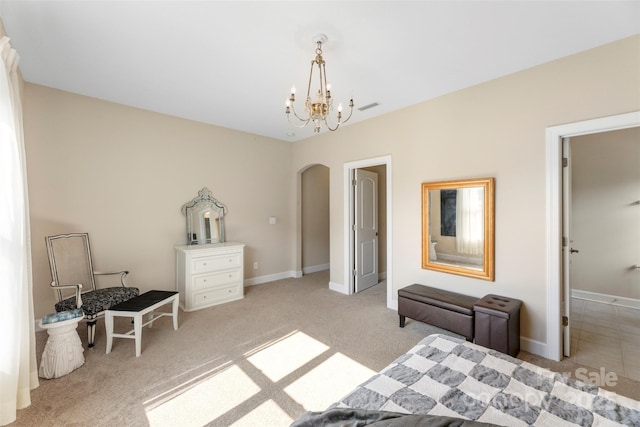 1204 Vaugelas Ct, Monroe, NC 28110 - carpeted bedroom with a chandelier and arched walkways
