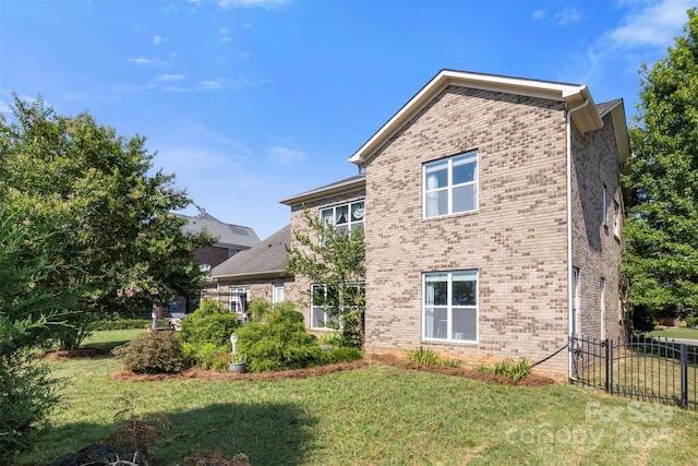 1204 Vaugelas Ct, Monroe, NC 28110 - rear view of house featuring brick siding