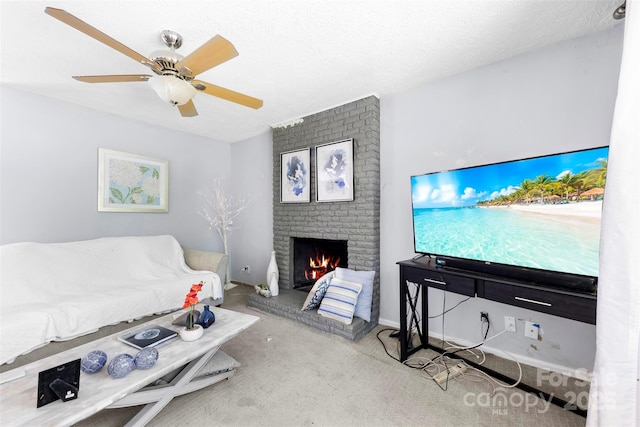 107 Laura Springs Dr, Salisbury, NC 28146 - carpeted living area featuring a fireplace, ceiling fan, and a textured ceiling