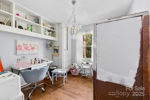 107 Laura Springs Dr, Salisbury, NC 28146 - office space with wood finished floors, a textured ceiling, and a chandelier