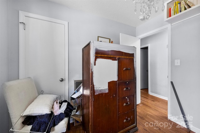 107 Laura Springs Dr, Salisbury, NC 28146 - sitting room featuring wood finished floors and a textured ceiling