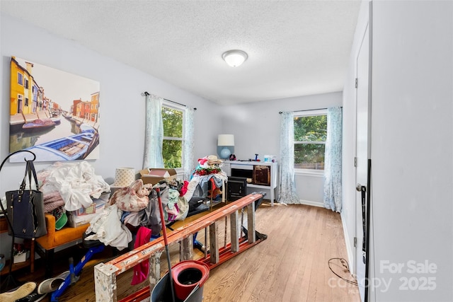 107 Laura Springs Dr, Salisbury, NC 28146 - office space with healthy amount of natural light, light wood-type flooring, and a textured ceiling