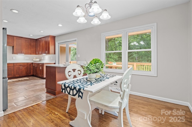 15 Beaverdam Ct, Asheville, NC 28804 - dining space featuring a chandelier, light wood finished floors, and recessed lighting