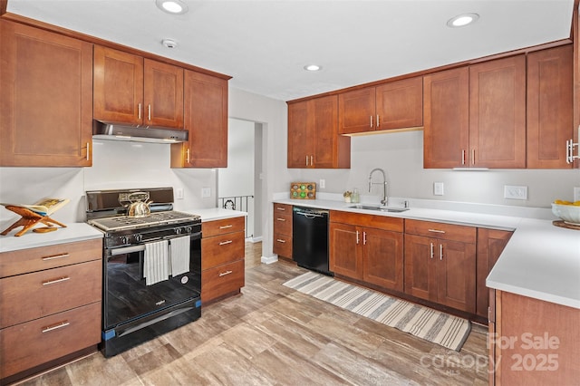 15 Beaverdam Ct, Asheville, NC 28804 - kitchen featuring black appliances, under cabinet range hood, light countertops, recessed lighting, and brown cabinets