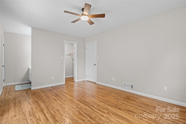 15 Beaverdam Ct, Asheville, NC 28804 - empty room with a ceiling fan and light wood-style floors