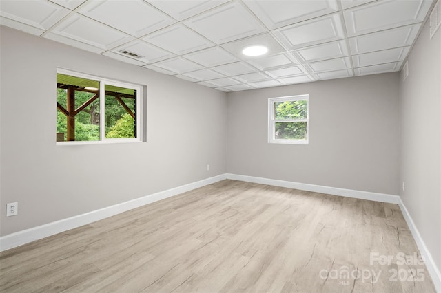 15 Beaverdam Ct, Asheville, NC 28804 - spare room featuring light wood-style flooring and baseboards
