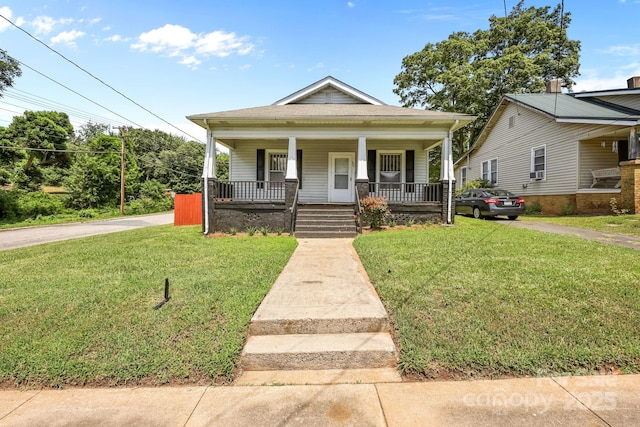 200 N Martin Luther King Jr Ave, Salisbury, NC 28144 - view of front of house with covered porch and a front yard