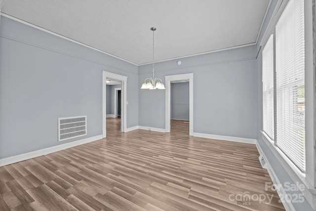 200 N Martin Luther King Jr Ave, Salisbury, NC 28144 - unfurnished dining area with a chandelier and wood finished floors