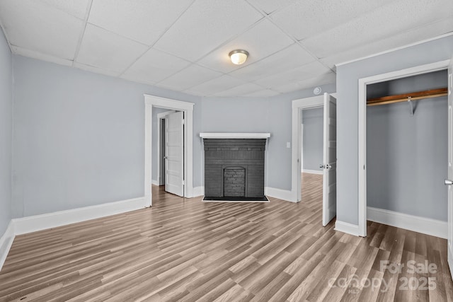 200 N Martin Luther King Jr Ave, Salisbury, NC 28144 - unfurnished living room with a paneled ceiling and wood finished floors