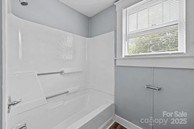 200 N Martin Luther King Jr Ave, Salisbury, NC 28144 - bathroom featuring shower / tub combination and baseboards