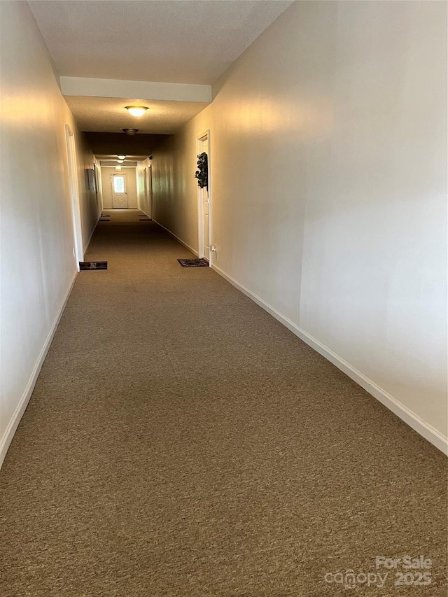 140 Lake Concord Rd NE Unit B7, Concord, NC 28025 - hall with dark colored carpet and baseboards