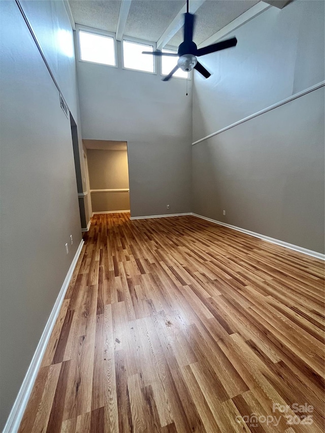 140 Lake Concord Rd NE Unit B7, Concord, NC 28025 - spare room with wood finished floors and a ceiling fan