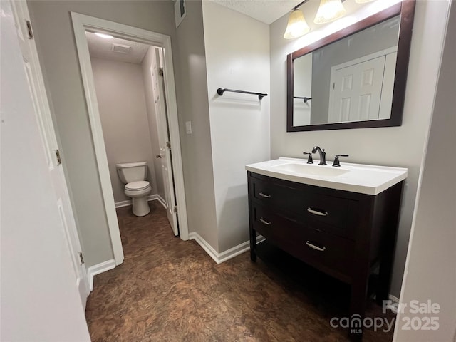140 Lake Concord Rd NE Unit B7, Concord, NC 28025 - bathroom featuring vanity and toilet