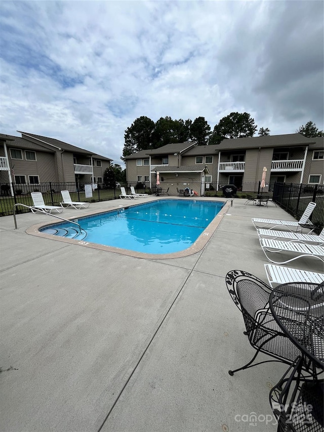 140 Lake Concord Rd NE Unit B7, Concord, NC 28025 - community pool featuring a patio area