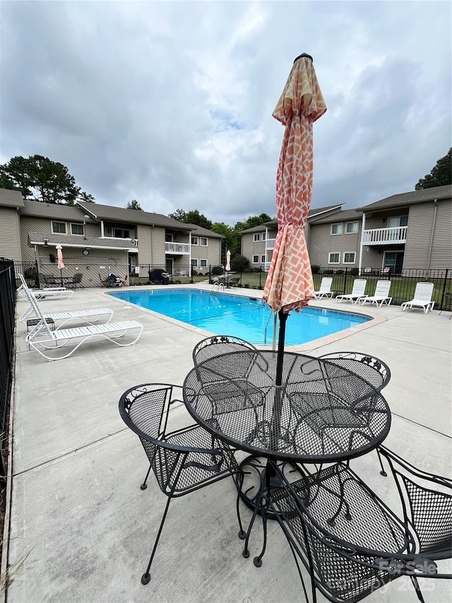 140 Lake Concord Rd NE Unit B7, Concord, NC 28025 - community pool featuring a patio