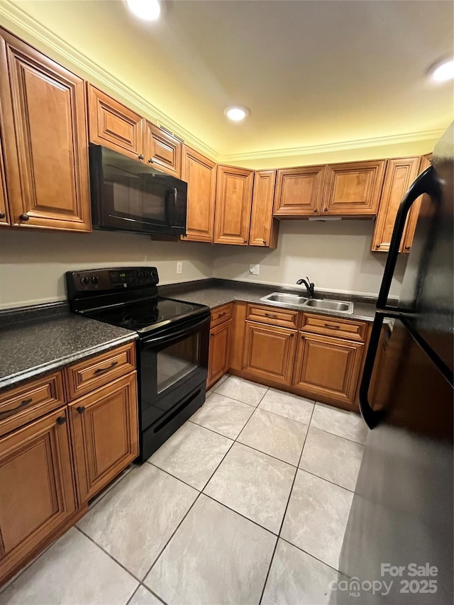 140 Lake Concord Rd NE Unit B7, Concord, NC 28025 - kitchen featuring black appliances, brown cabinetry, dark countertops, light tile patterned floors, and recessed lighting