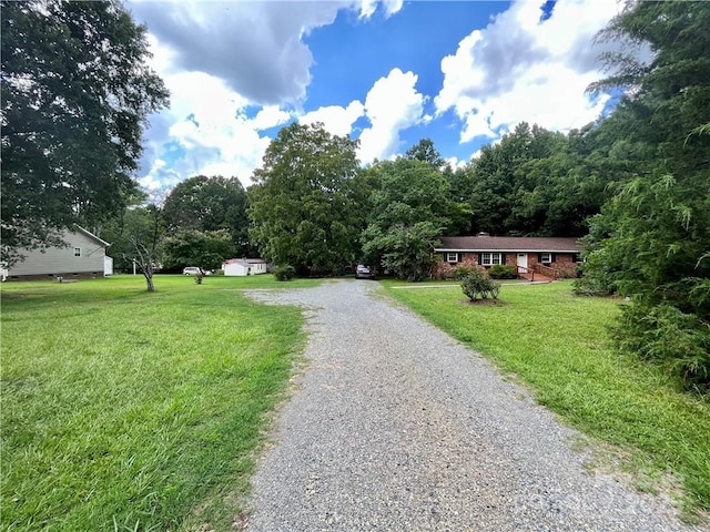 5419 Stevens Mill Rd, Matthews, NC 28104 - view of dirt / gravel driveway