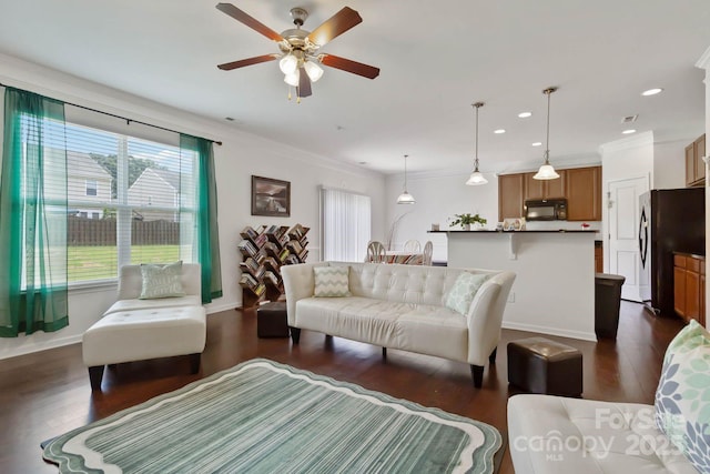 2932 Berry Creek Rd, Charlotte, NC 28214 - living room featuring dark wood-type flooring, a ceiling fan, ornamental molding, and recessed lighting