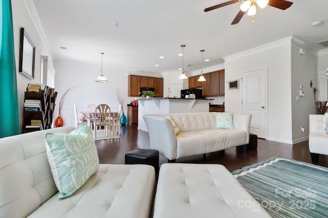 2932 Berry Creek Rd, Charlotte, NC 28214 - living area with dark wood-type flooring, ceiling fan, ornamental molding, and recessed lighting