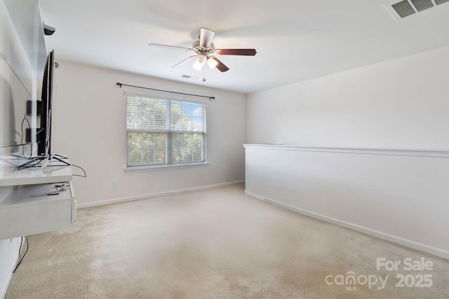 2932 Berry Creek Rd, Charlotte, NC 28214 - unfurnished living room featuring ceiling fan and light colored carpet