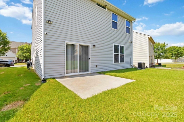 2932 Berry Creek Rd, Charlotte, NC 28214 - rear view of property featuring a lawn and a patio
