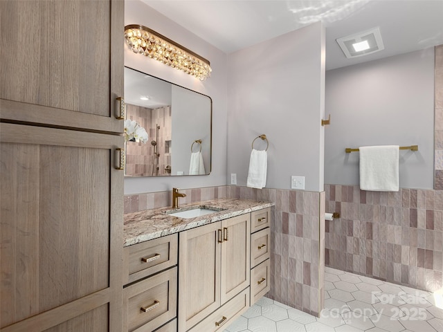 184 Sandys Home Pl, Mars Hill, NC 28754 - bathroom featuring tile walls, vanity, a wainscoted wall, and tile patterned floors