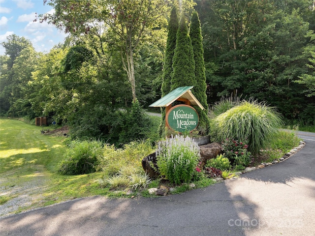 184 Sandys Home Pl, Mars Hill, NC 28754 - community / neighborhood sign with a wooded view and a lawn