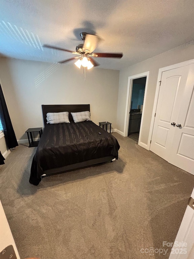 408 E 22nd St, Kannapolis, NC 28083 - bedroom featuring carpet flooring, a textured ceiling, and ceiling fan