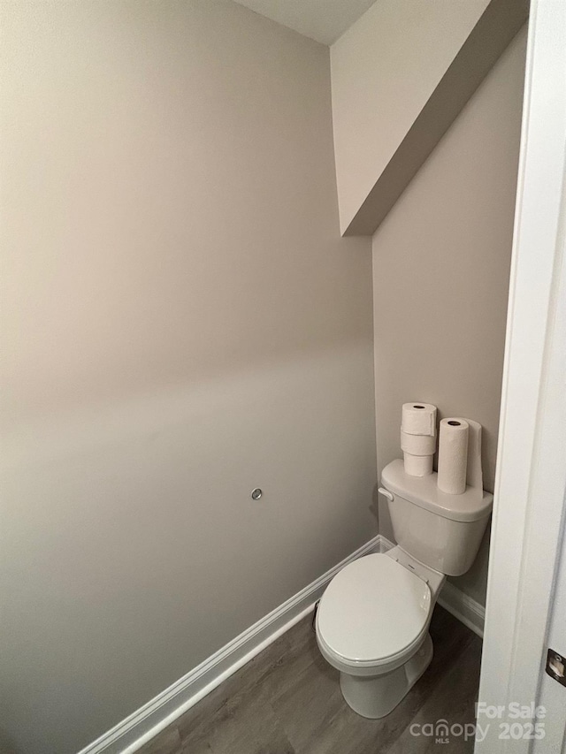 408 E 22nd St, Kannapolis, NC 28083 - bathroom with wood finished floors and baseboards
