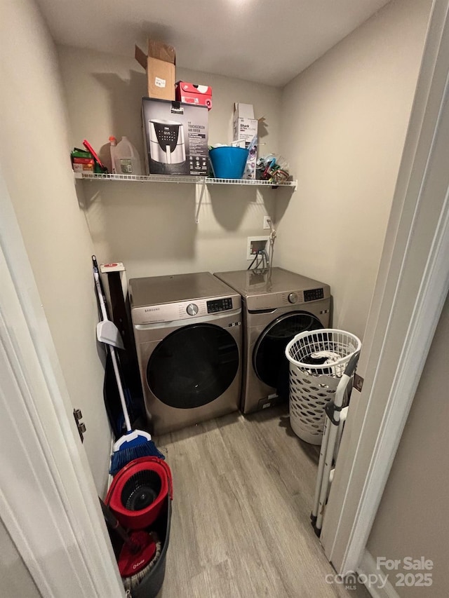 408 E 22nd St, Kannapolis, NC 28083 - laundry room with washer and clothes dryer and wood finished floors