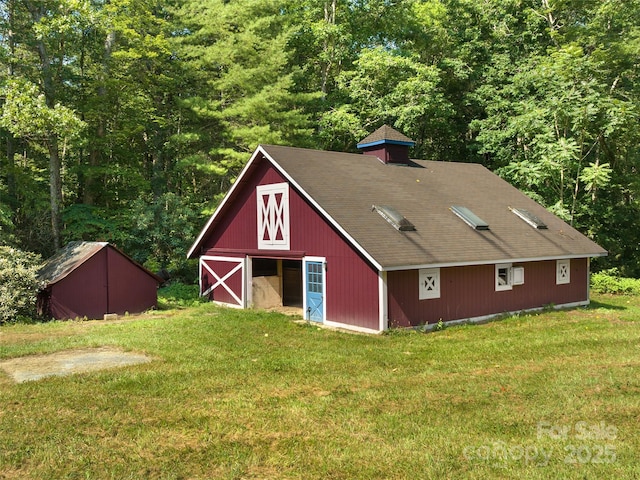 599 Red Fox Ln, Flat Rock, NC 28731 - view of barn featuring a yard