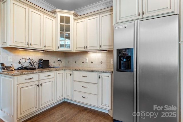 2301 Willow Creek Dr, Newton, NC 28658 - kitchen featuring stainless steel refrigerator with ice dispenser, cream cabinets, light stone counters, decorative backsplash, and glass insert cabinets