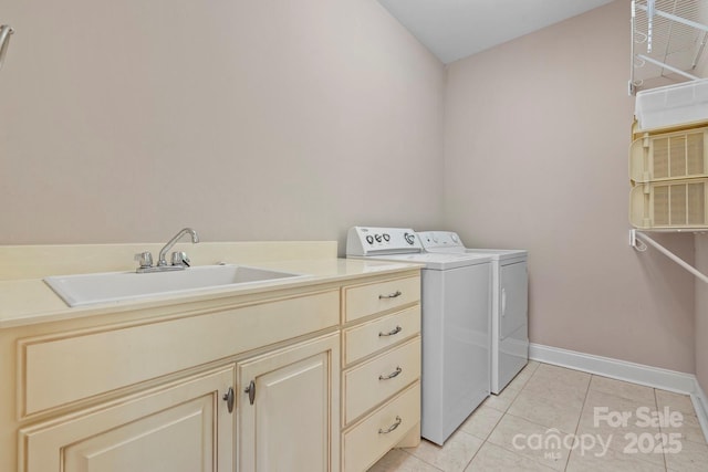 2301 Willow Creek Dr, Newton, NC 28658 - washroom featuring washing machine and clothes dryer, cabinet space, and light tile patterned floors