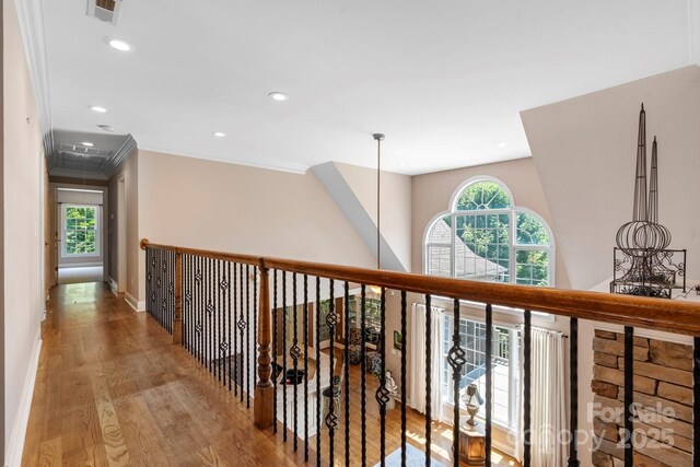 2301 Willow Creek Dr, Newton, NC 28658 - hall with attic access, wood finished floors, recessed lighting, and crown molding