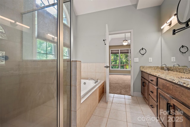 60 Bridge Ln, Tryon, NC 28782 - full bath with double vanity, a garden tub, a shower stall, tile patterned floors, and ceiling fan