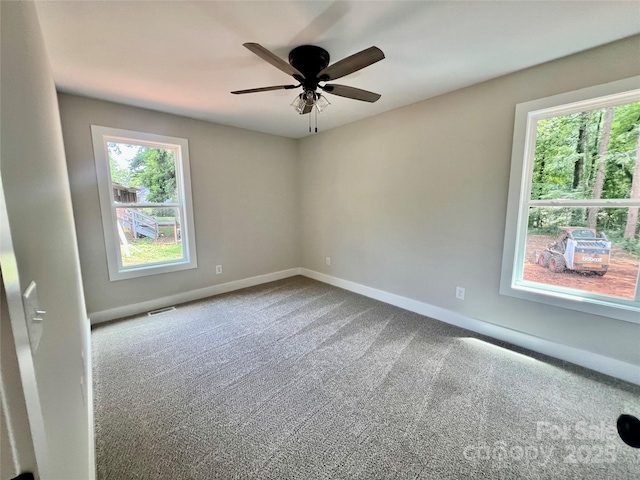 234 W Vance St, China Grove, NC 28023 - empty room with ceiling fan and carpet flooring