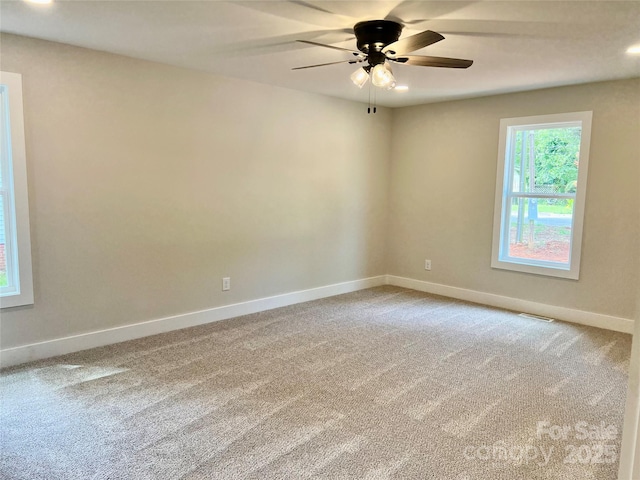234 W Vance St, China Grove, NC 28023 - carpeted empty room featuring a ceiling fan and recessed lighting