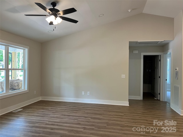 234 W Vance St, China Grove, NC 28023 - spare room featuring dark wood-style flooring, vaulted ceiling, ceiling fan, and a smoke detector