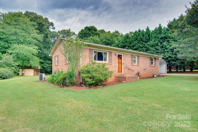 1715 Nelson Dr, Newton, NC 28658 - ranch-style house featuring brick siding, a front lawn, and a shed