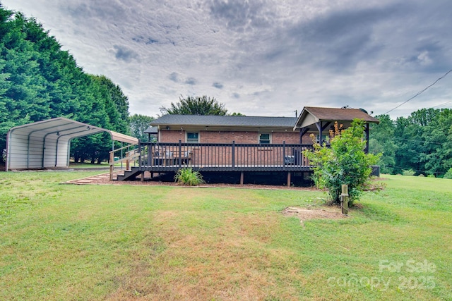 1715 Nelson Dr, Newton, NC 28658 - rear view of house with a yard, a deck, a detached carport, and brick siding