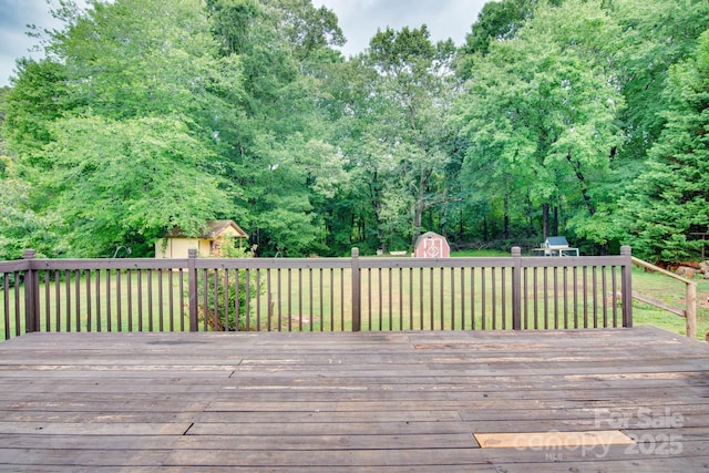1715 Nelson Dr, Newton, NC 28658 - wooden deck featuring a shed and view of scattered trees