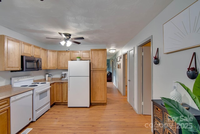 1715 Nelson Dr, Newton, NC 28658 - kitchen featuring white appliances, a ceiling fan, light wood-type flooring, light countertops, and light brown cabinets