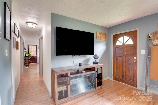 1715 Nelson Dr, Newton, NC 28658 - foyer entrance with light wood-style floors and baseboards