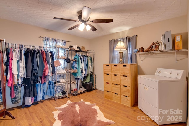 1715 Nelson Dr, Newton, NC 28658 - walk in closet with washer / dryer, ceiling fan, and light wood-style flooring